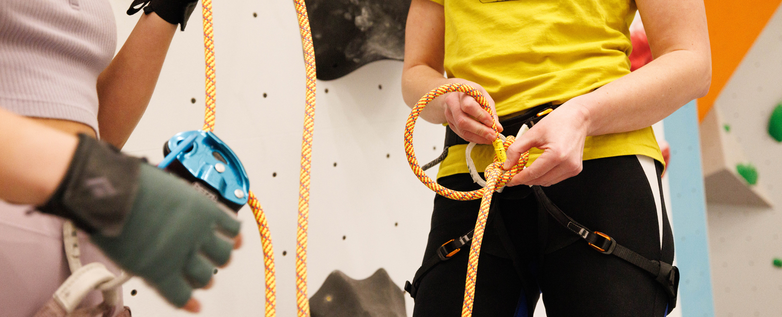 climbers tying for belay